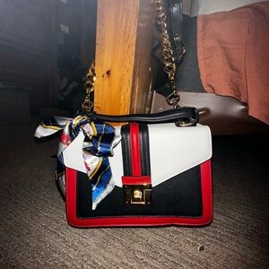 Chic Black, White, and Red Crossbody Bag with Scarf